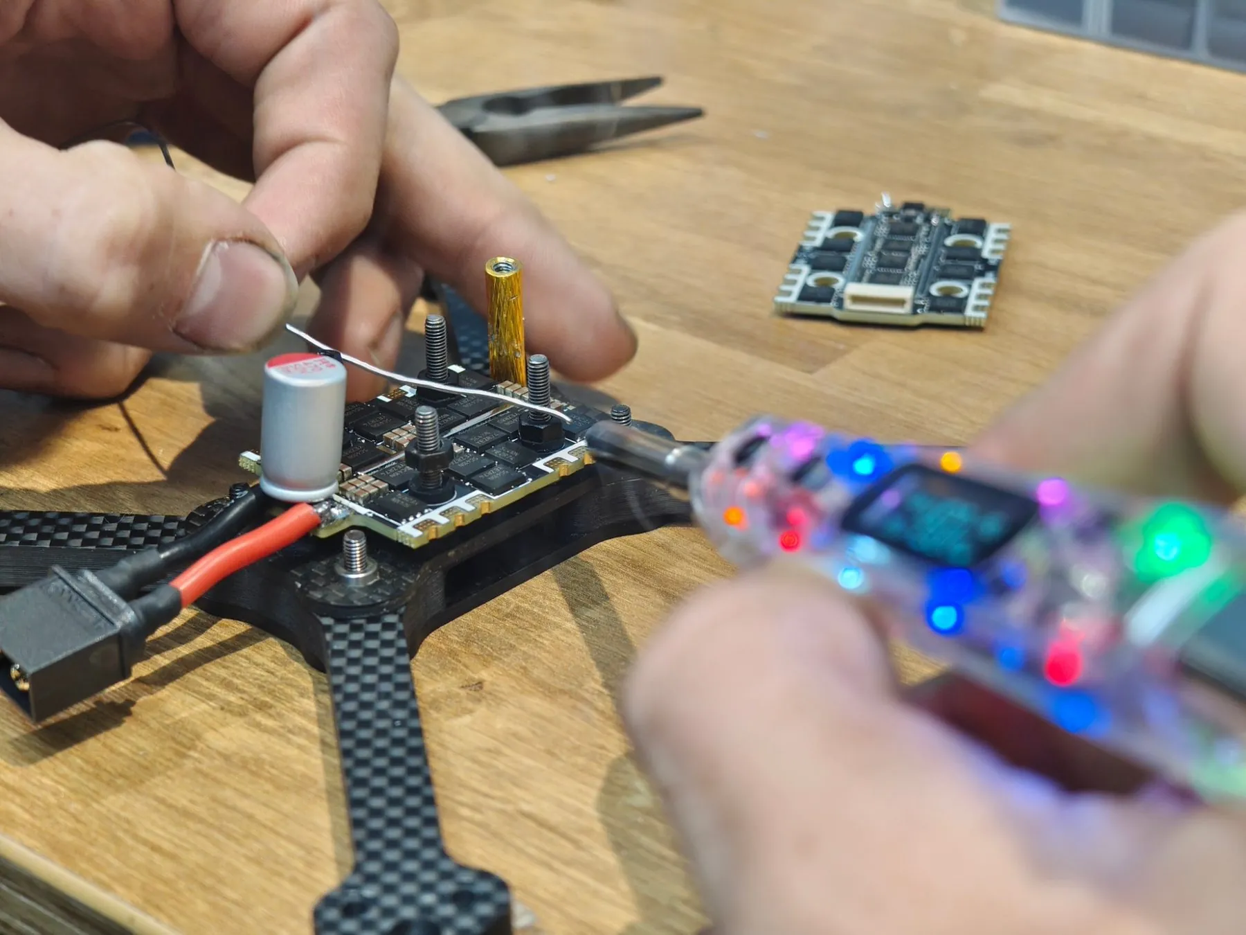 FPV drones on Dan's build bench