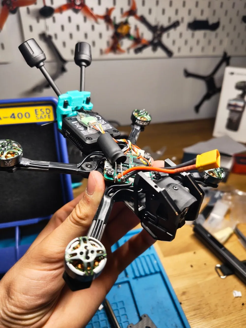 A freshly built FPV drone in the workshop