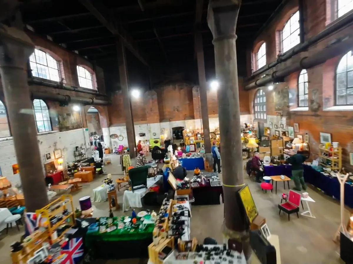 FPV fly-through of a busy events hall full of stalls
